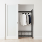 Black metal clothes rack with a top hanging bar Multi Market World Inc.