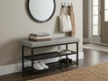 Grey cushion entryway shoe bench with black metal frame and 2 mesh shelves