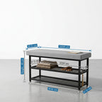 Black metal shoe bench with grey padded seat and shoe storage