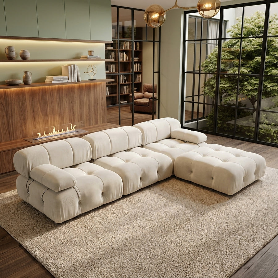 Modern tufted modular sectional sofa with chaise, low-profile design, in a living room