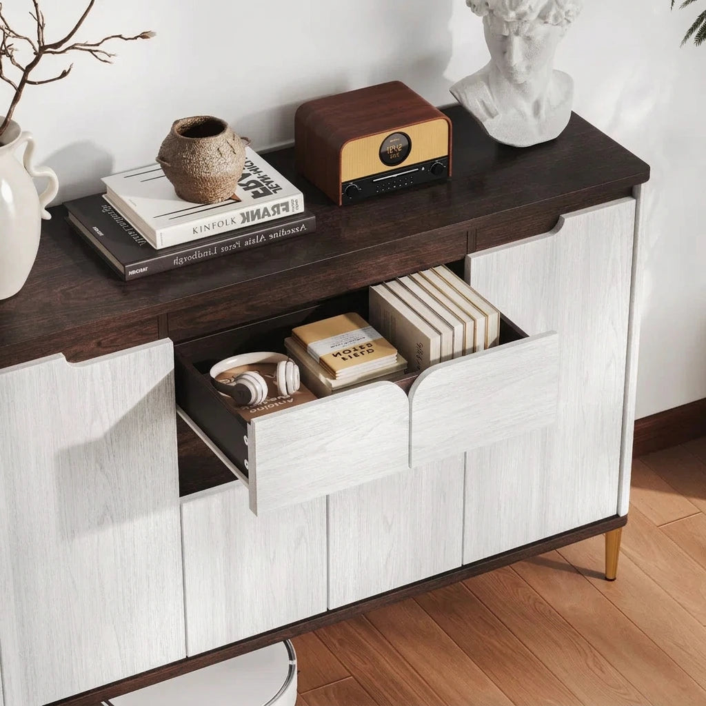 Sideboard drawer open with books and headphones, dark walnut top with radio and decor
