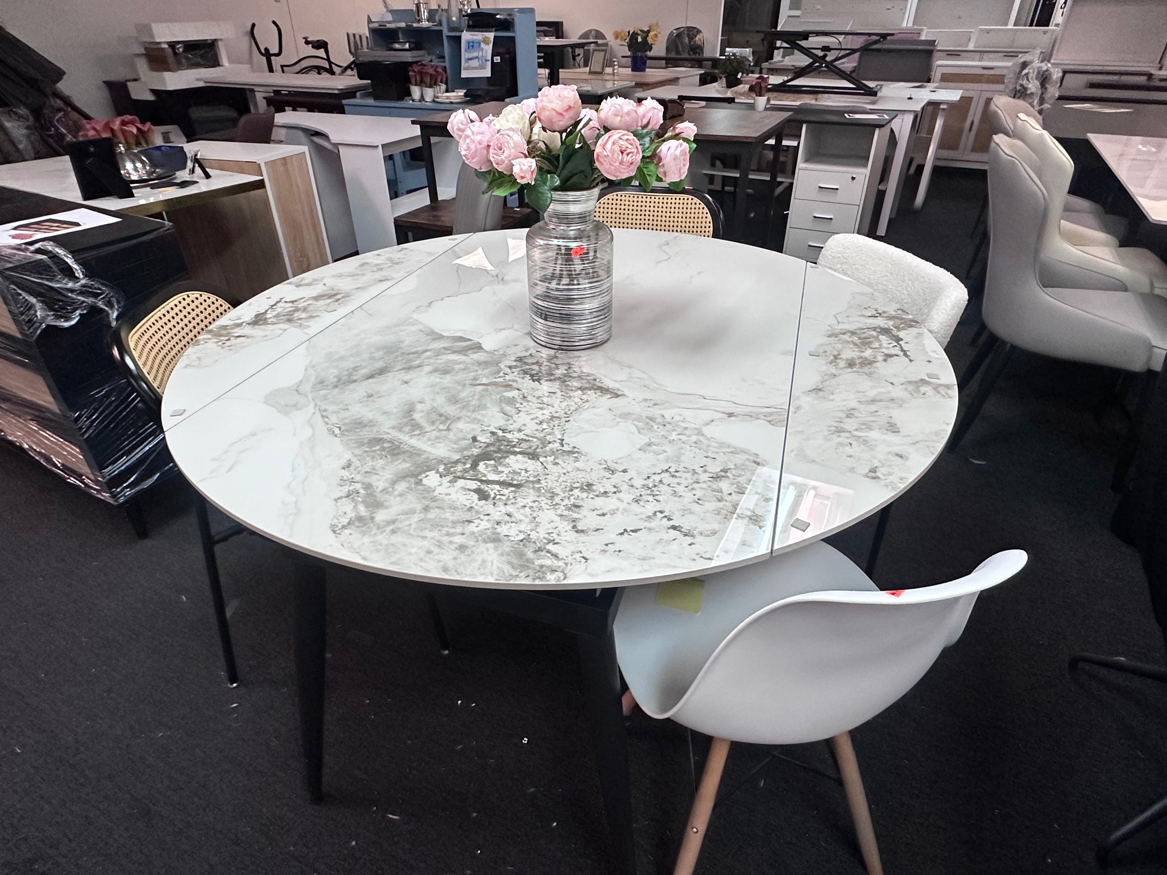 Round Sintered Stone Dining Table - Space-Saving Drop Leaf Design, 135cm to 86cm Width, Black Tapered Legs, White/Grey Multi Market World Inc.