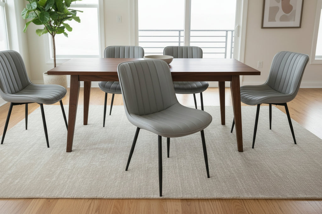 Gray and pink chairs with quilted seat in a store setting