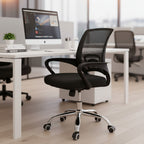 Gray office chair with mesh back in a room with other chairs